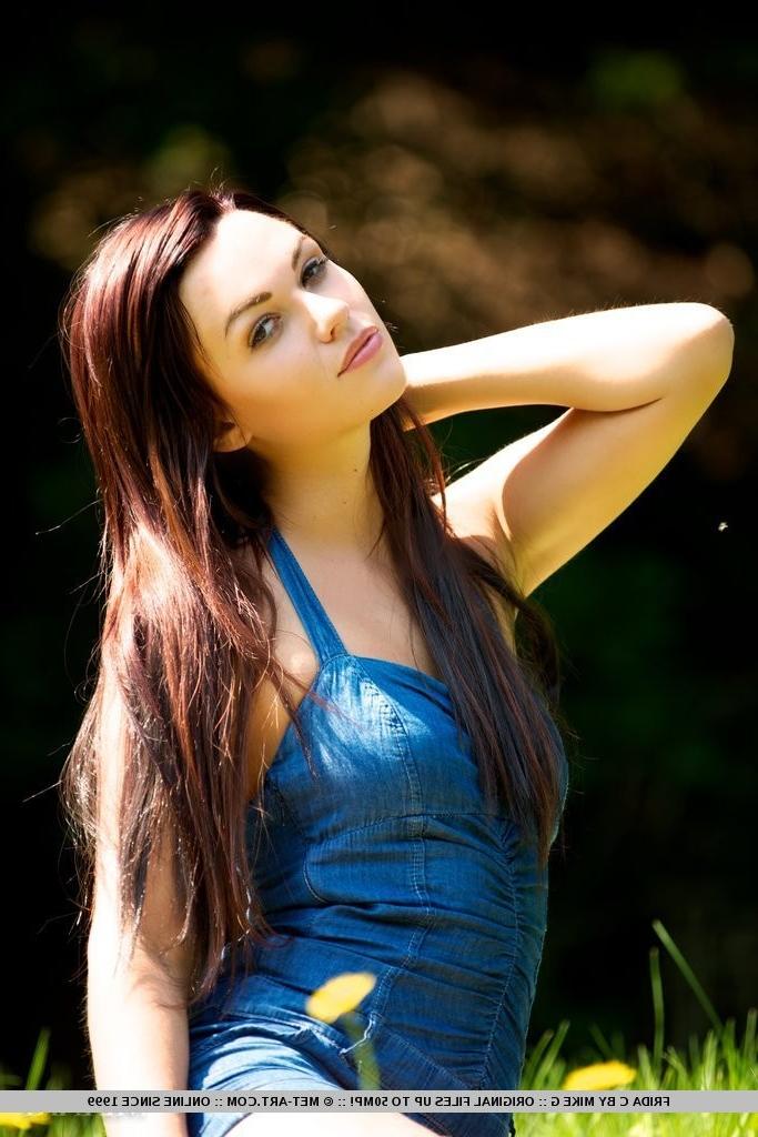 18P Pretty brunette poses nude in the park!