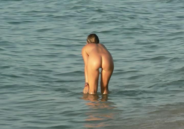 9P Sexy teens play together at a public beach