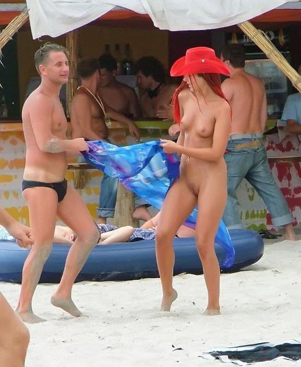 9P Sexy teens play together at a public beach