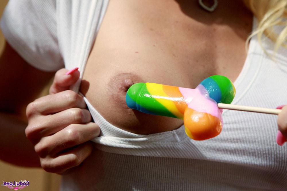 15P Blonde Cody Love plays with a lollypop