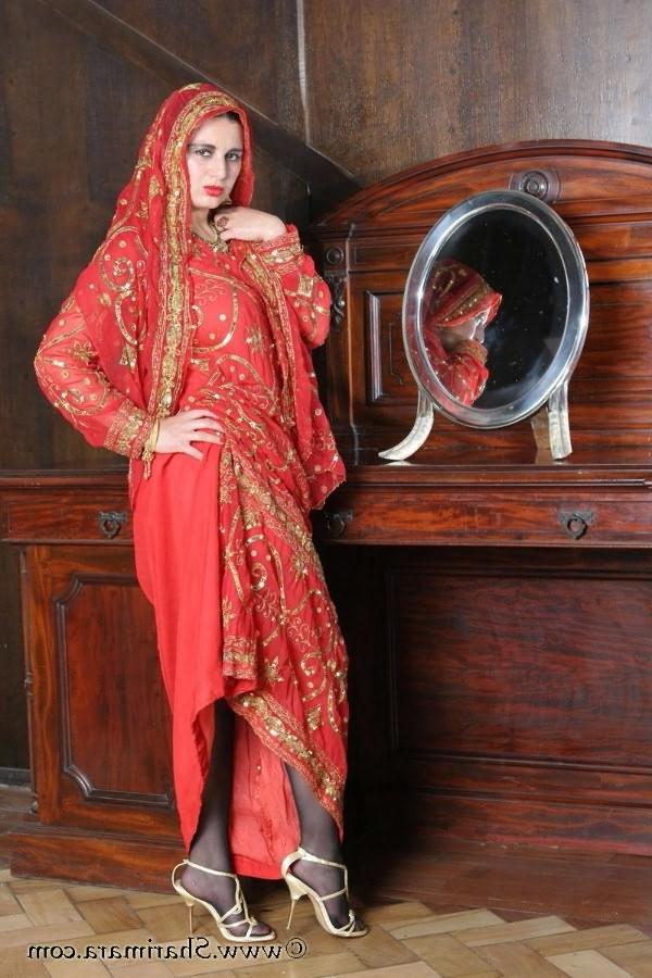 12P Hot indian doll showing off her sexy nyloned legs and ass