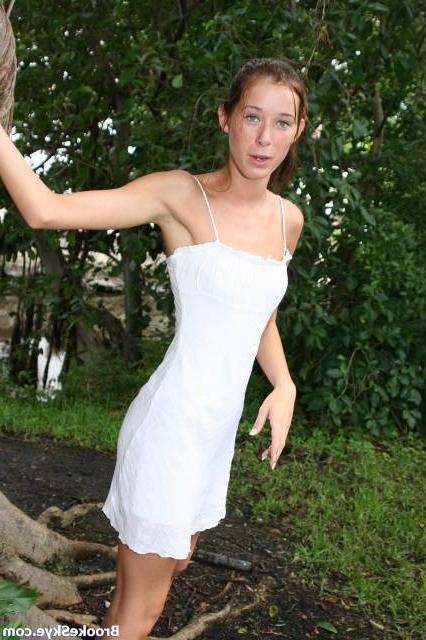 16P brunette cutie posing in the park