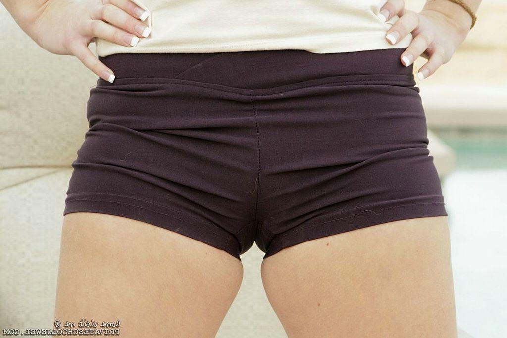 15P Naughty blonde teen flashing at the back yard pool