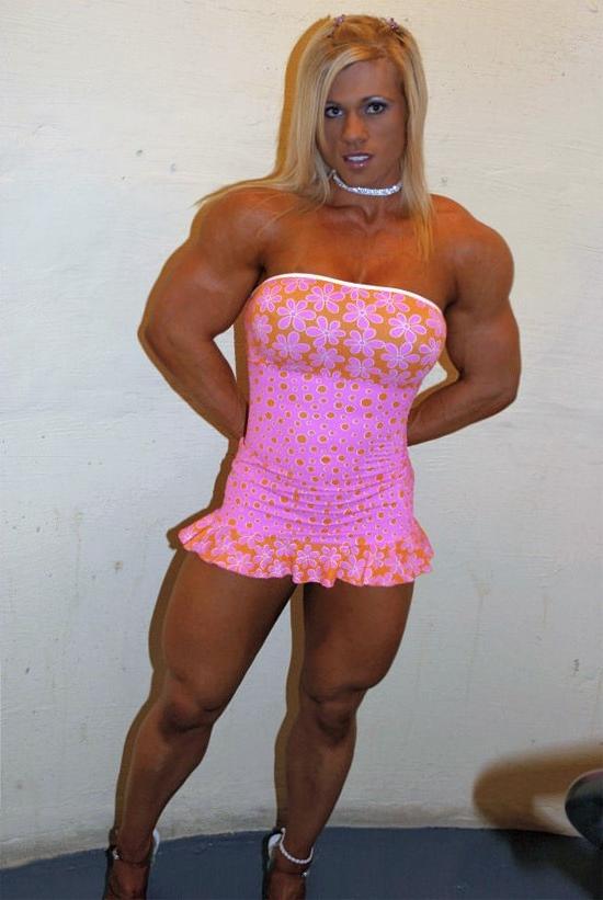 12P Very hot busty muscular blonde posing in tight dress