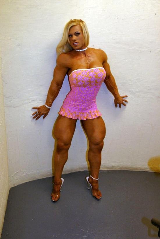 12P Very hot busty muscular blonde posing in tight dress