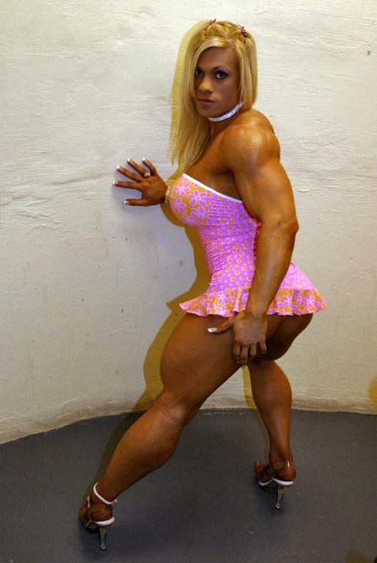 12P Very hot busty muscular blonde posing in tight dress