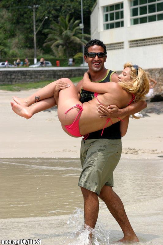 13P This blonde brazilian bombshell is rockin that pink bikini like it was made for 