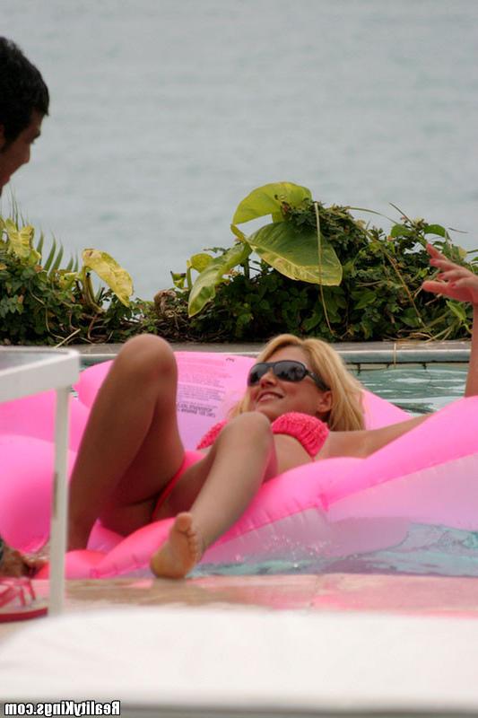 13P This blonde brazilian bombshell is rockin that pink bikini like it was made for 