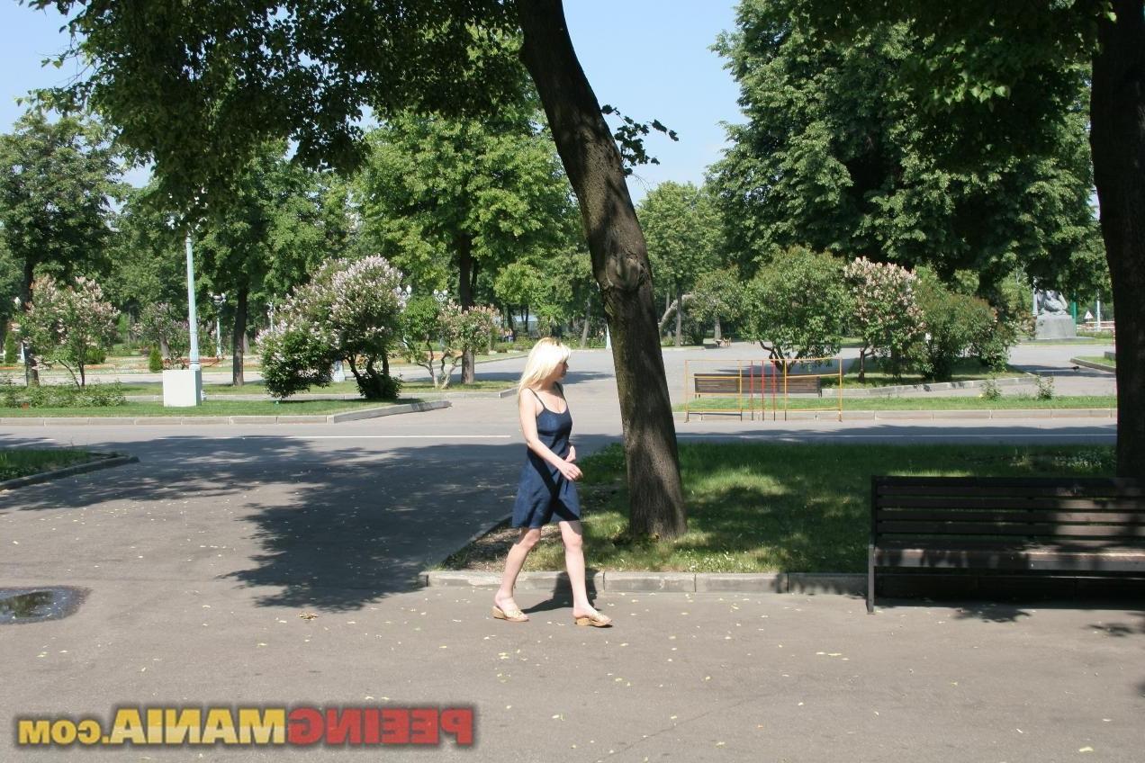 10P An impressive pee spot on the white panties done by a park blonde girl