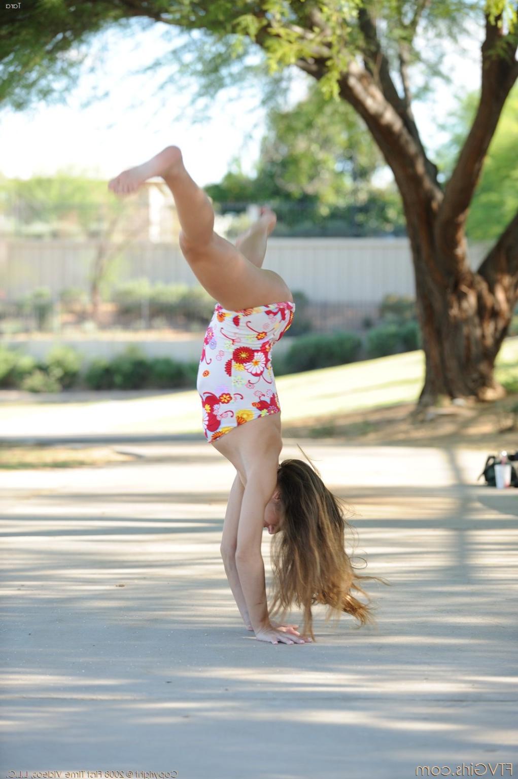 15P Sweet teen Tara does a flip in the park