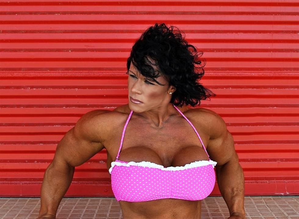 12P Impressive huge female bodybuilder Aleesha Young flexing her mas