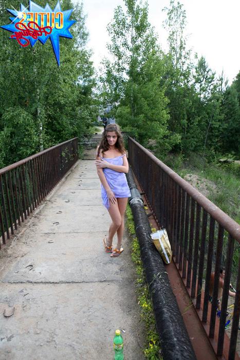 16P Sexy doll flashes her shaven pinkie off the bridge
