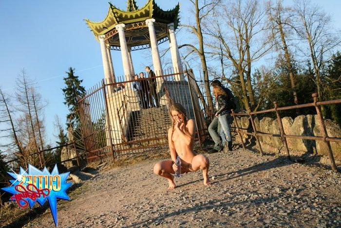 16P Blonde teen plays with her slit in the city park