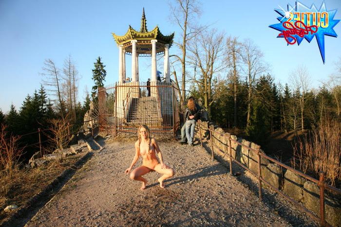 16P Blonde teen plays with her slit in the city park