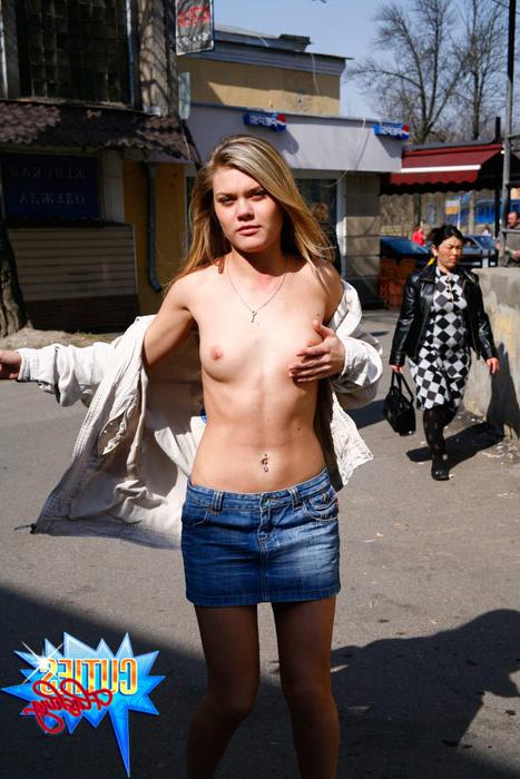 16P Busty blonde teen in mini flashes her twat in a public place