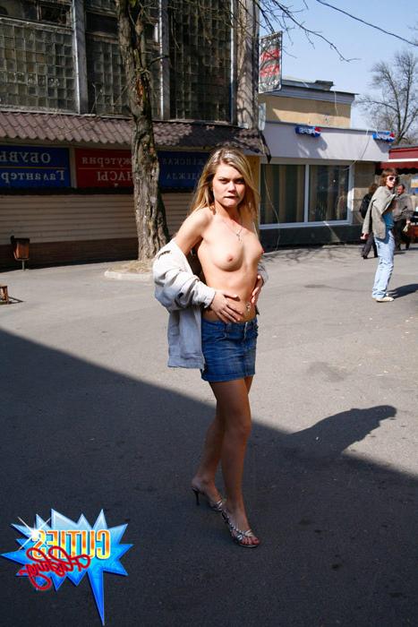 16P Busty blonde teen in mini flashes her twat in a public place