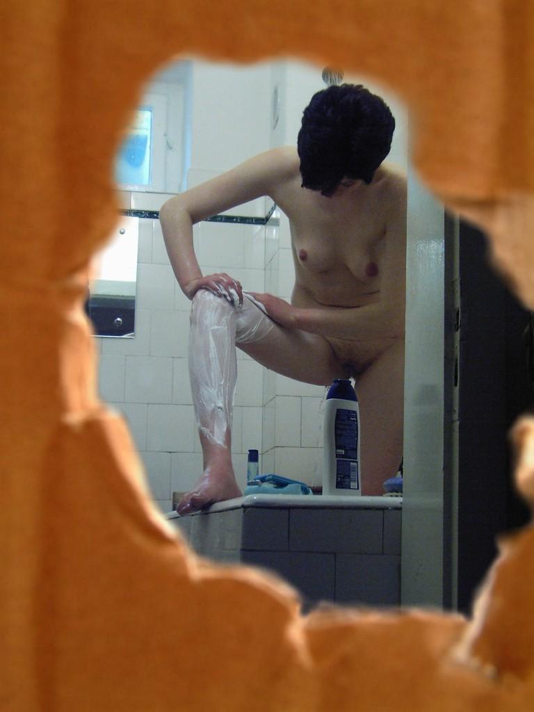 16P Voyeur fetish peeks at brunette babe shaving in the shower