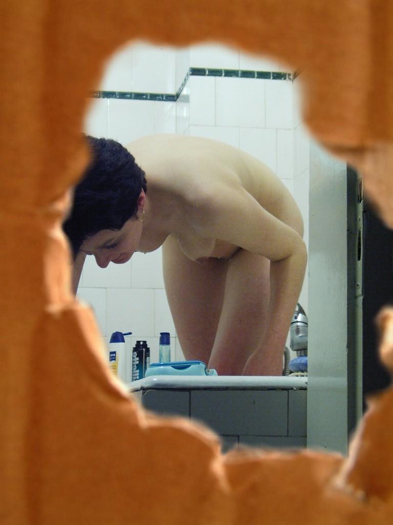 16P Voyeur fetish peeks at brunette babe shaving in the shower
