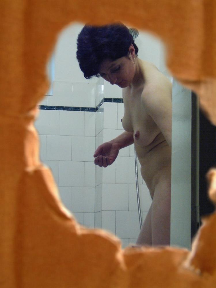 16P Hidden camera voyeur shower shots of pussy shaving brunette