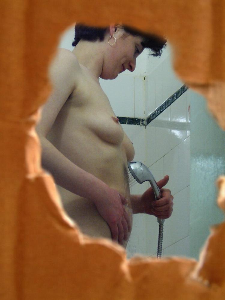 16P Hidden camera voyeur shower shots of pussy shaving brunette