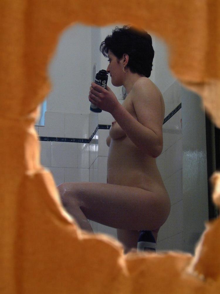 16P Hidden camera voyeur shower shots of pussy shaving brunette