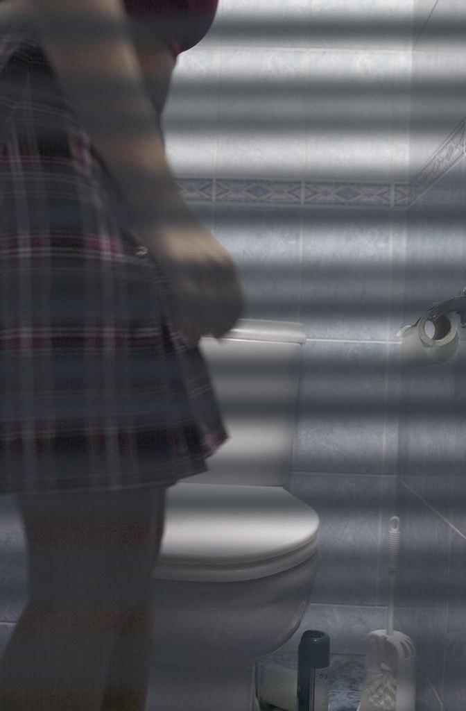 16P Toilet hidden camera catches peeing babe with her panties down
