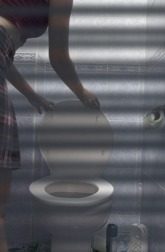 16P Toilet hidden camera catches peeing babe with her panties down