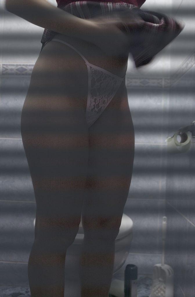 16P Toilet hidden camera catches peeing babe with her panties down