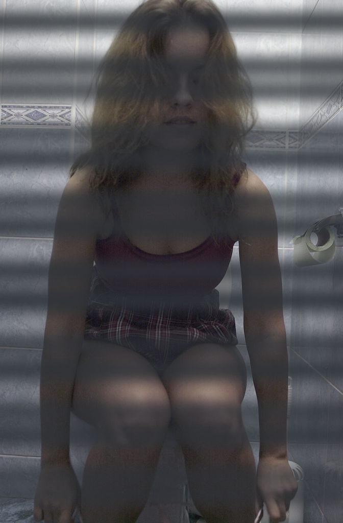 16P Toilet hidden camera catches peeing babe with her panties down