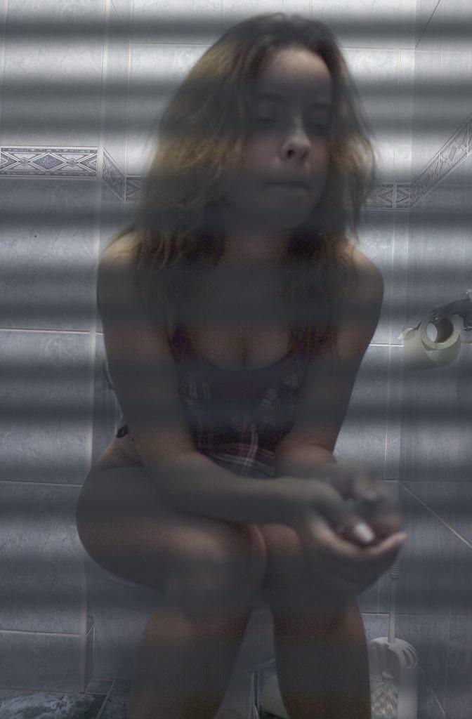 16P Toilet hidden camera catches peeing babe with her panties down