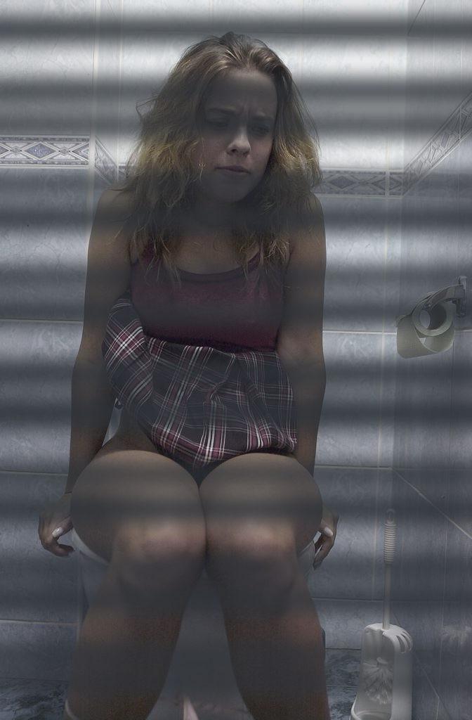 16P Toilet hidden camera catches peeing babe with her panties down