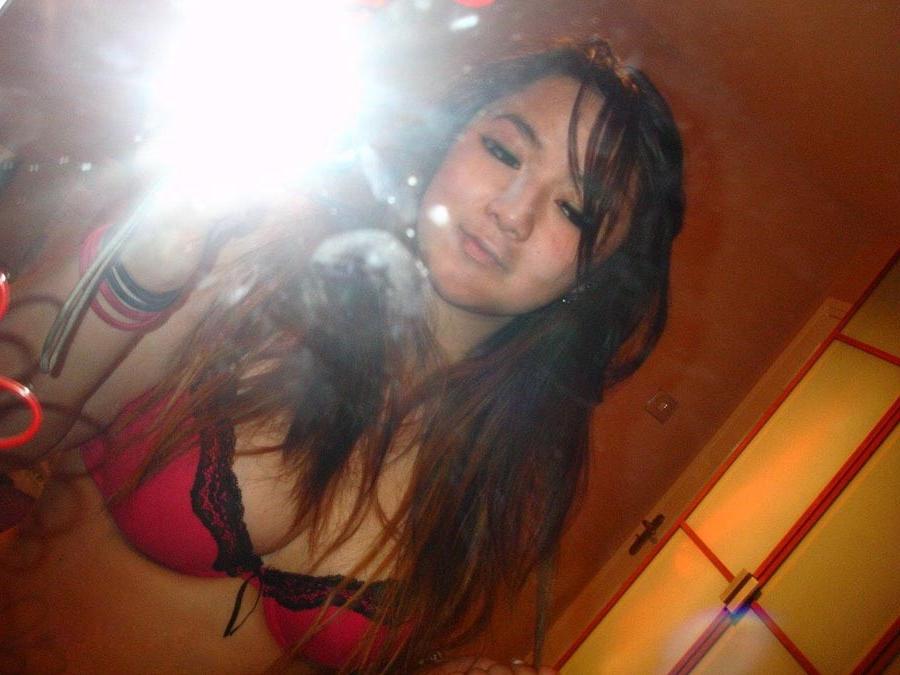 16P Busty asian camwhoring topless in her bedroom