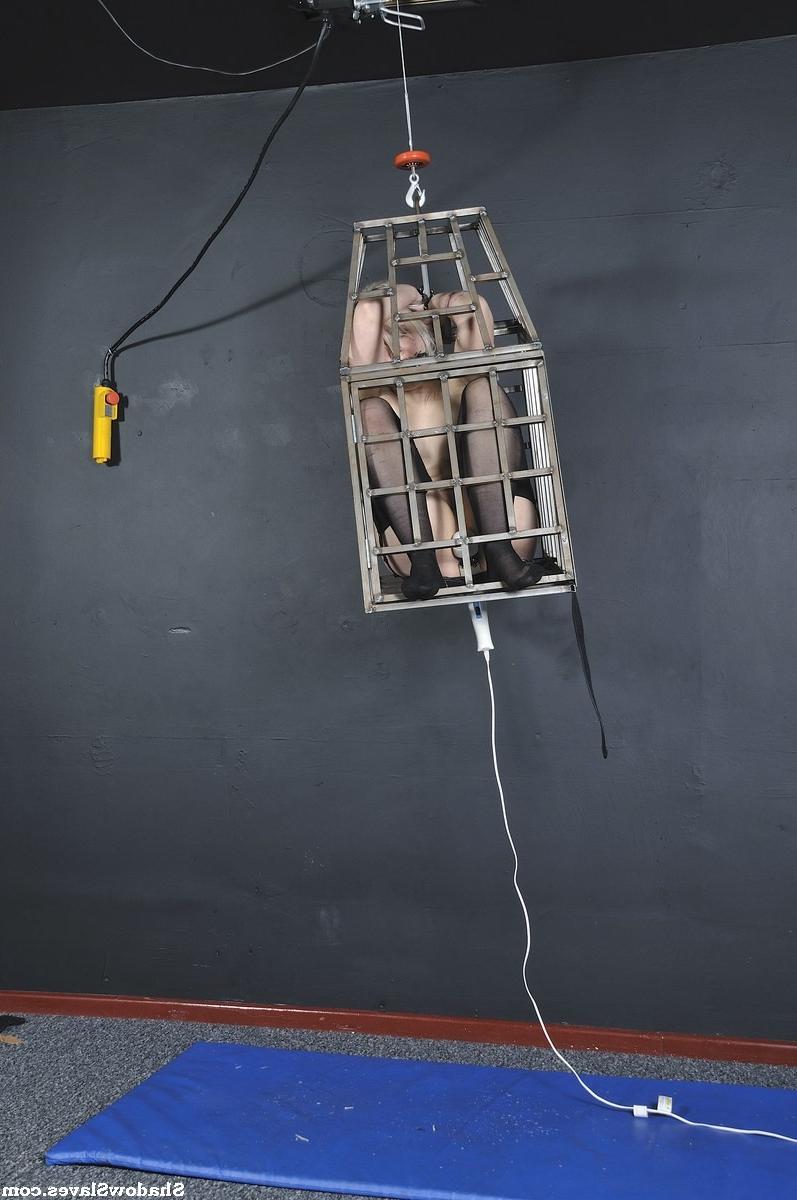 16P Amateur blonde subbie is caged and suspended from the ceiling