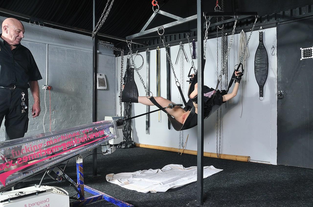 16P Amateur sub is laid in a bondage swing and put on a fucking mach