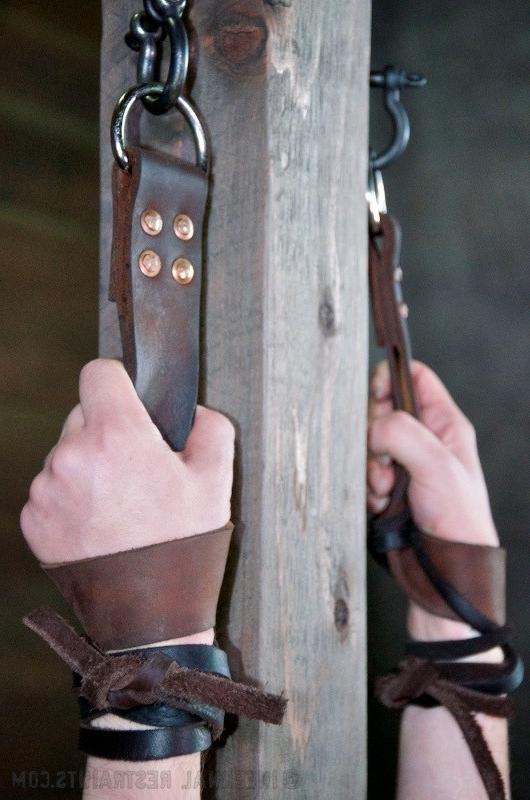 16P Iona Grace busty is spread in leather strap dungeon bondage