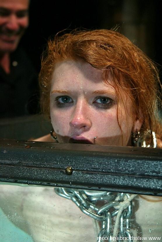 15P Madison Young hot redhead in bondage gets sprayed and dunked