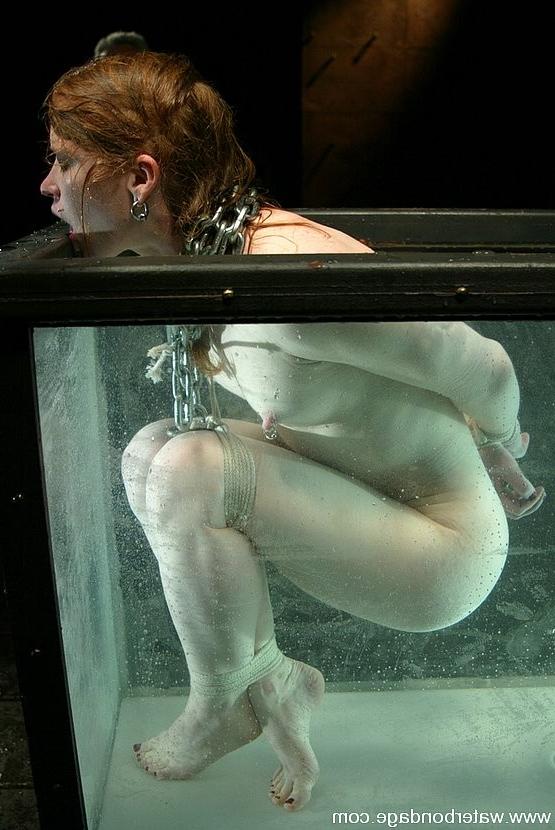15P Madison Young hot redhead in bondage gets sprayed and dunked