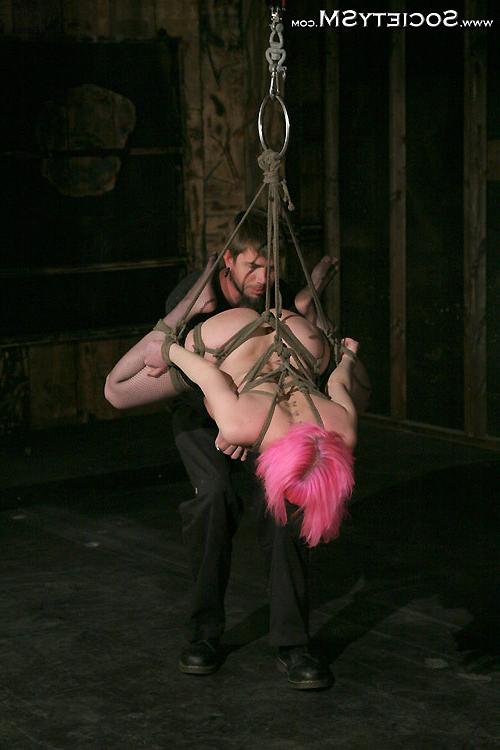 16P Cherry Torn has her ass plugged while in rope bondage