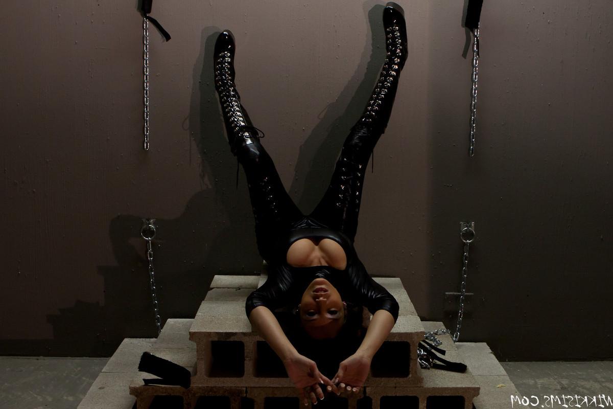 15P Nikki Sims as Catwoman for Halloween chained in bondage