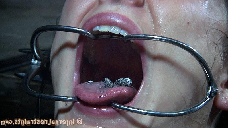15P Hailey Young in leather bondage crying out on high heels
