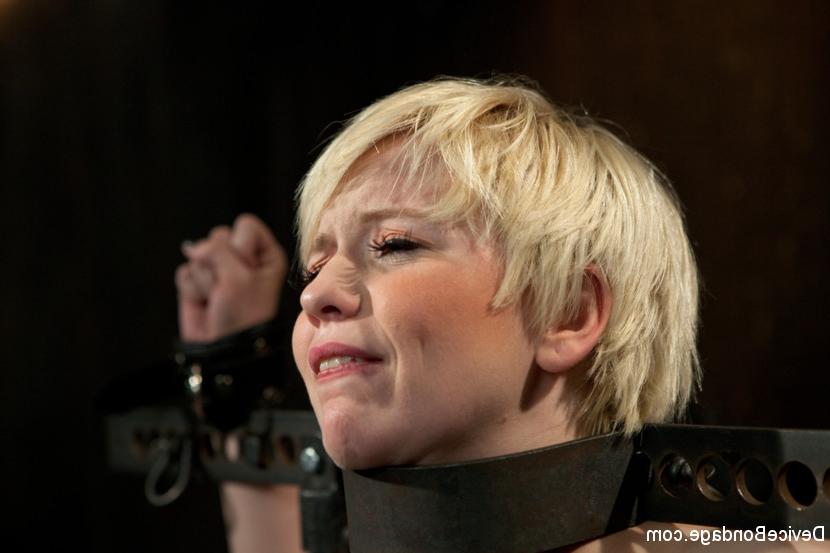 15P Alani Pi in metal device bondage gets her head completely shaved