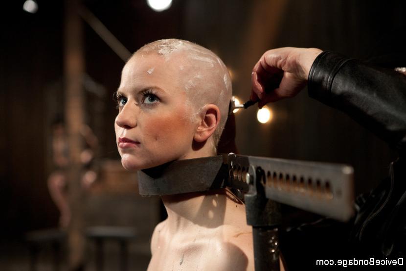 15P Alani Pi in metal device bondage gets her head completely shaved