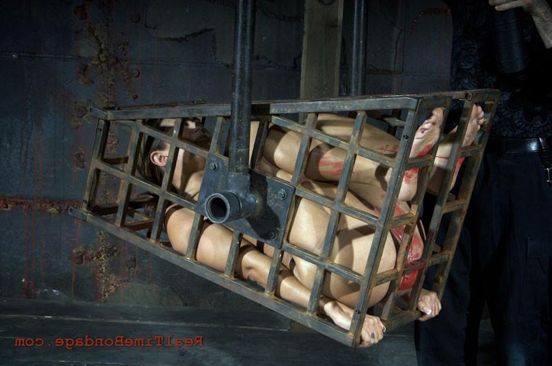 16P Things are heating up fast for Trina Michaels. She is all caged up but the memb