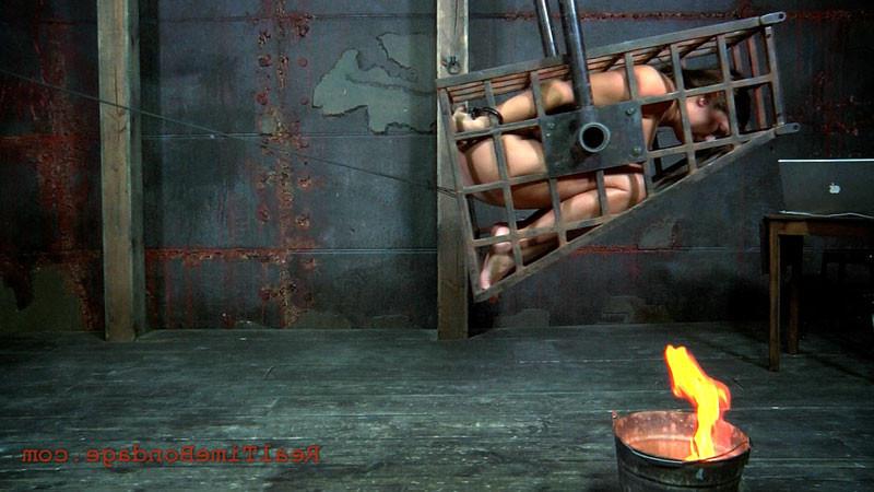 16P Things are heating up fast for Trina Michaels. She is all caged up but the memb
