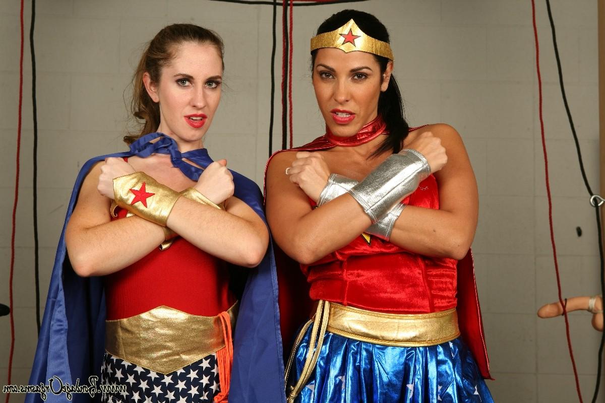 16P Superheroines Natali Demore and Veronica Rayne torture each other. 