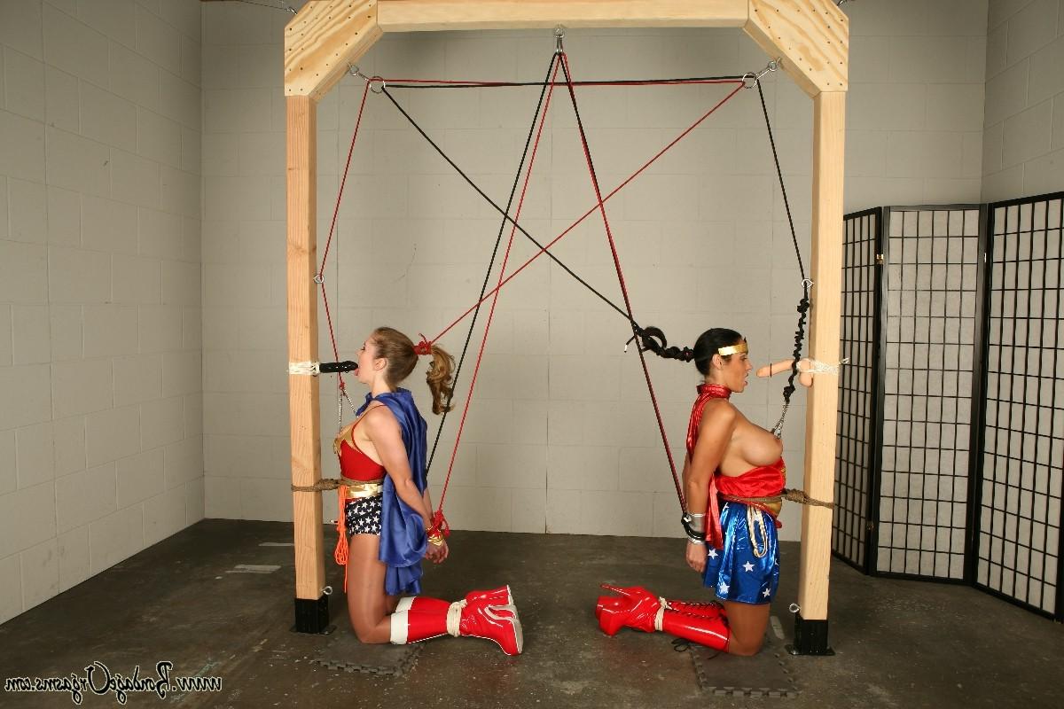 16P Superheroines Natali Demore and Veronica Rayne torture each other. 