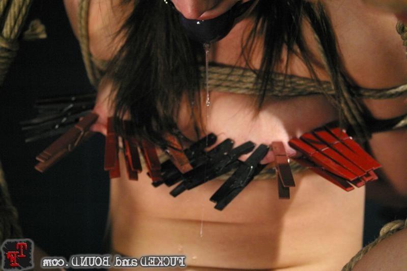 15P Excited brunette in hard rope bondage and having rough sex