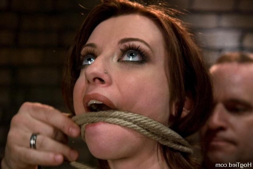 15P Redhead in bondage experience forced orgasm with dildo