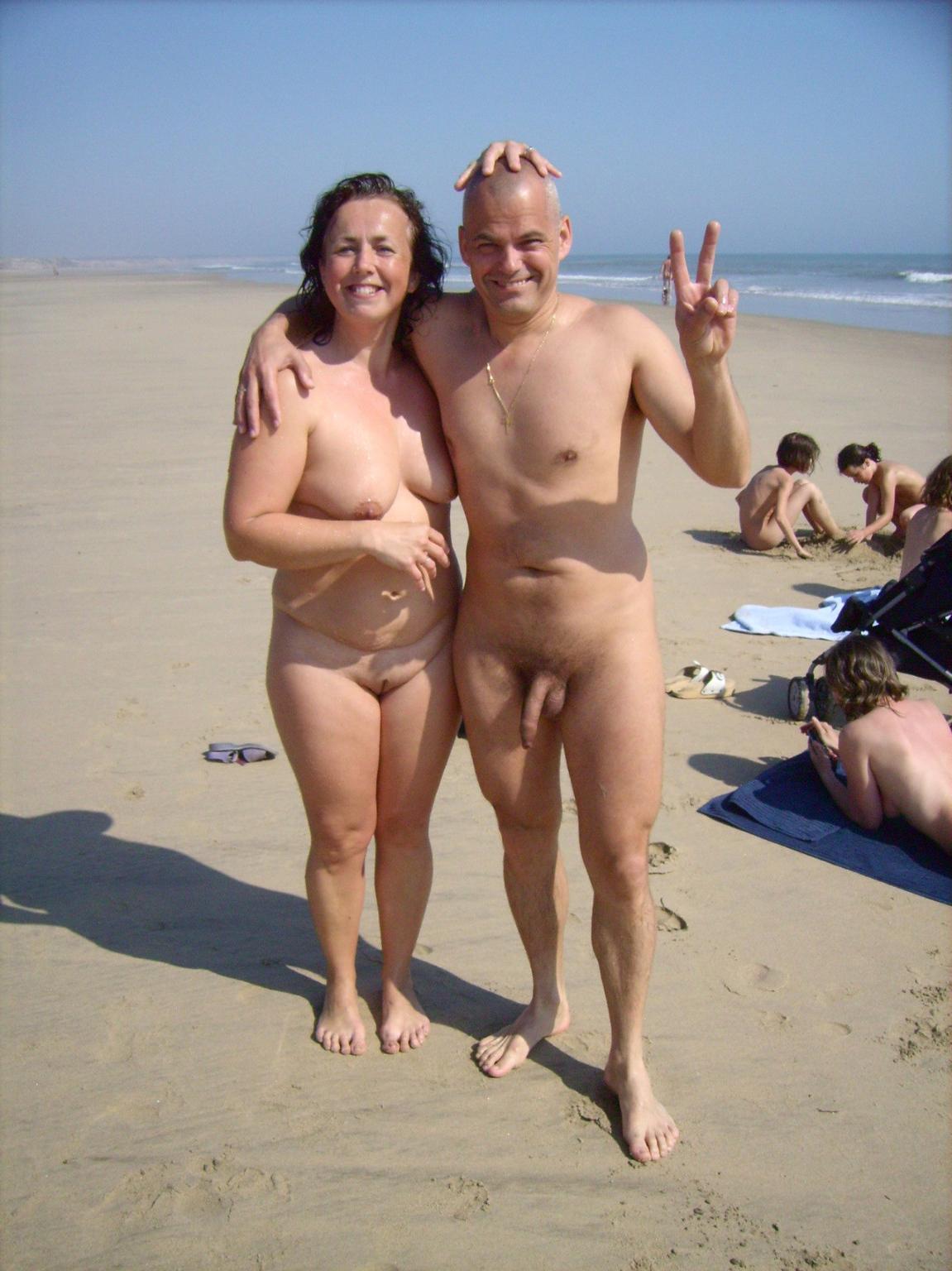 15P Her sexy body gets a tan after she strips naked