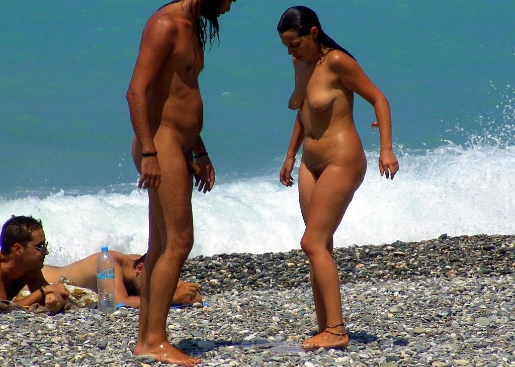 15P Nudist girls lay out in the sun totally exposed